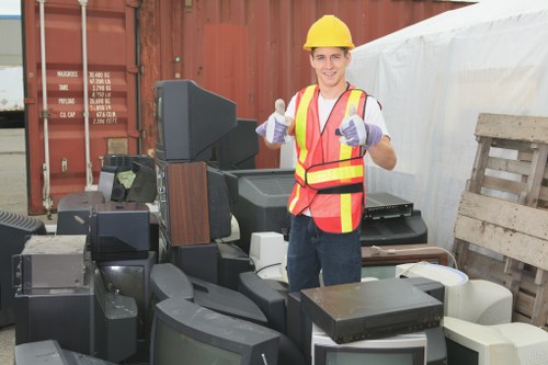 Investigator reviewing waste clearance records on site