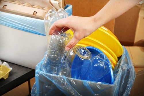 Professional team removing bulky furniture items