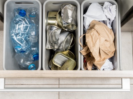 Professional team clearing out cluttered garage space